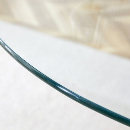 A glass tabletop with a diameter of 35 inches and a modern minimalist circular dining table with electroplated silver metal legs. Suitable for restaurants, living rooms, and conference rooms.