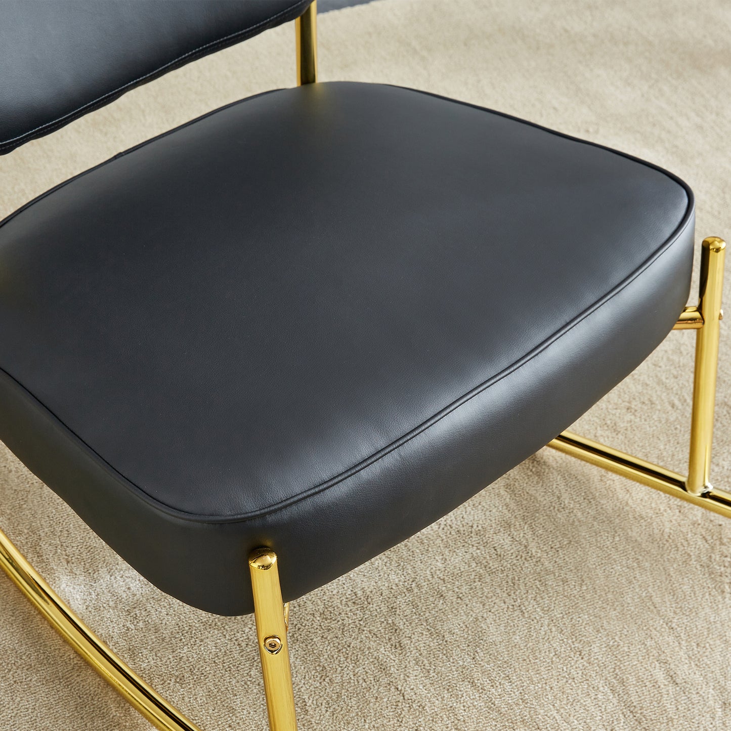 PU material cushioned rocking chair,unique rocking chair, cushioned seat, black backrest rocking chair, and gold metal legs.Comfortable side chairs in the living room, bedroom, and office