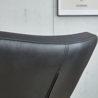 PU material cushioned rocking chair,unique rocking chair, cushioned seat, black backrest rocking chair, and gold metal legs.Comfortable side chairs in the living room, bedroom, and office