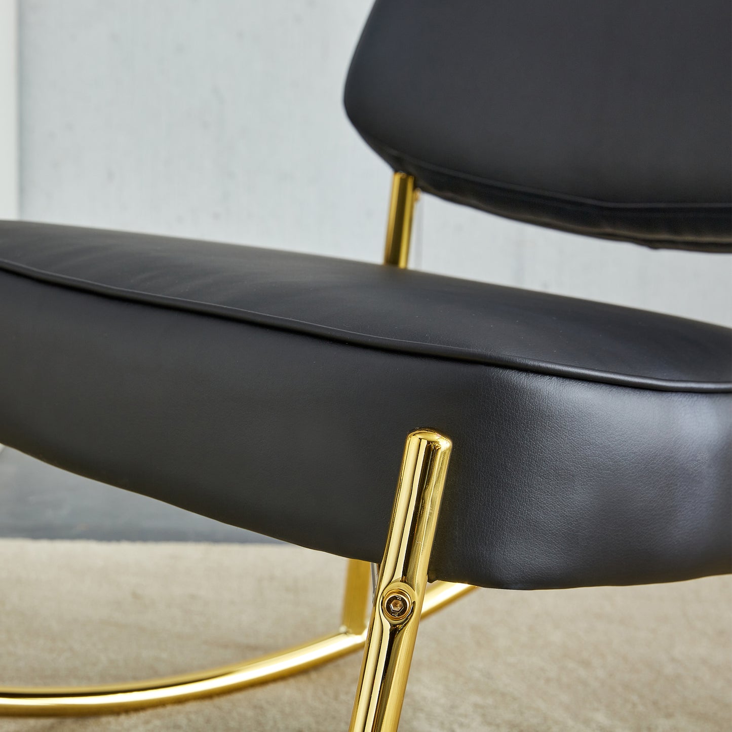 PU material cushioned rocking chair,unique rocking chair, cushioned seat, black backrest rocking chair, and gold metal legs.Comfortable side chairs in the living room, bedroom, and office