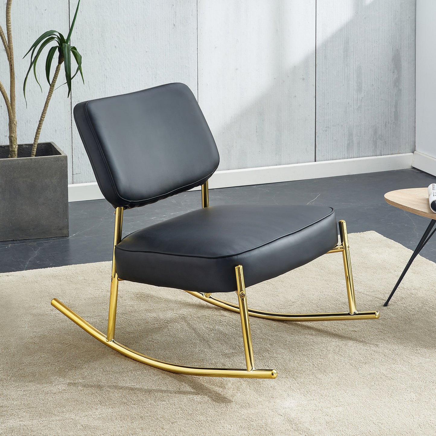 PU material cushioned rocking chair,unique rocking chair, cushioned seat, black backrest rocking chair, and gold metal legs.Comfortable side chairs in the living room, bedroom, and office