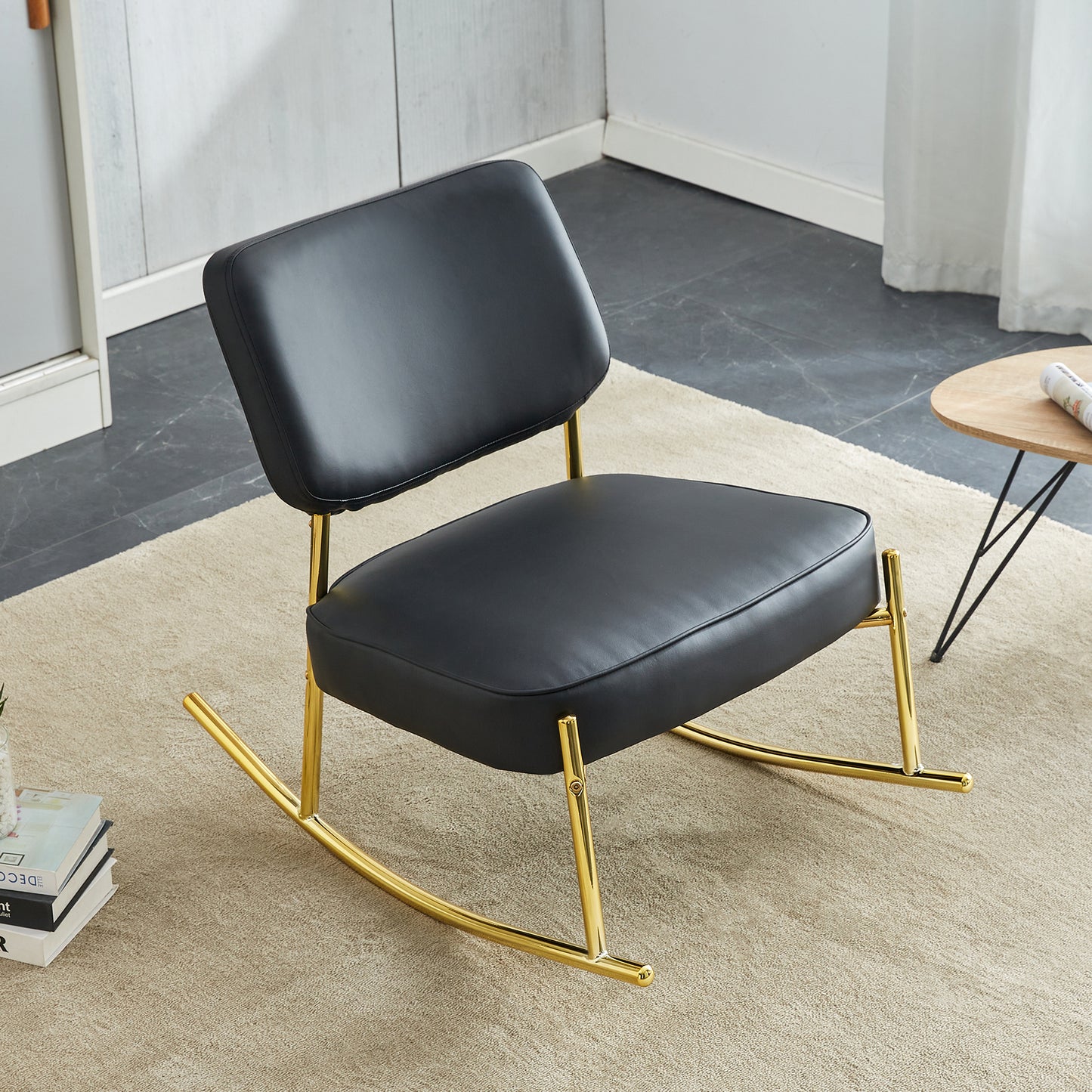 PU material cushioned rocking chair,unique rocking chair, cushioned seat, black backrest rocking chair, and gold metal legs.Comfortable side chairs in the living room, bedroom, and office
