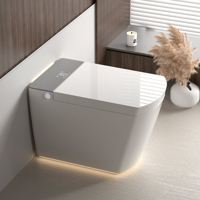 Modern integrated Smart toilet, Auto Open/Close lid, temperature heating seat, instant warm water cleaning, can automatically flush, remote control flush, foot sensing flush